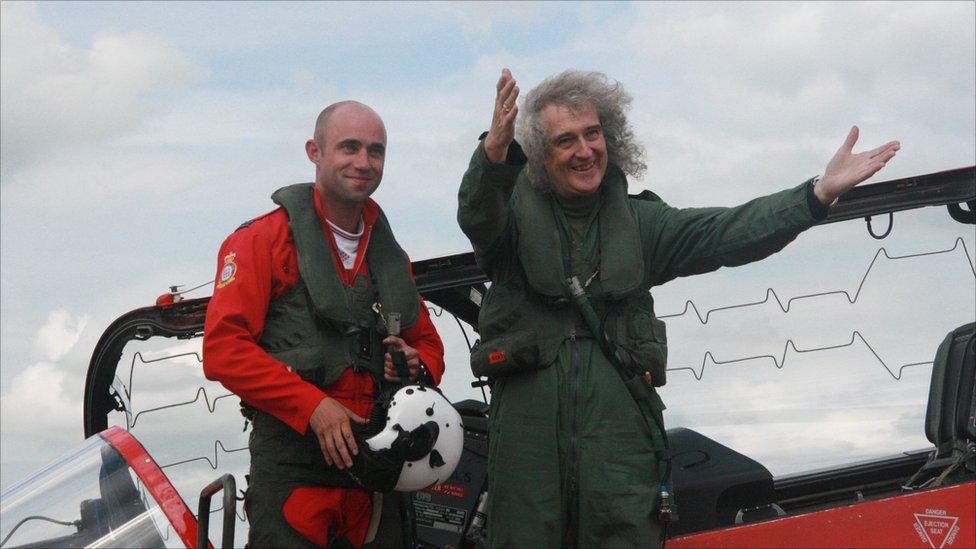 Pilot Ben Plank with Queen guitarist Brian May