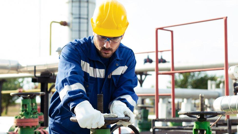 Worker at refinery