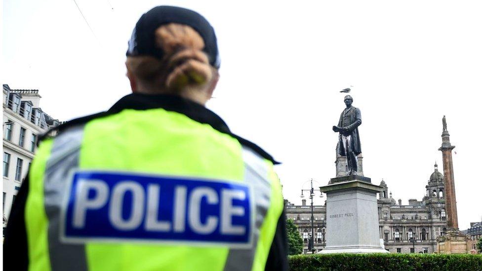 back view of Scottish police officer