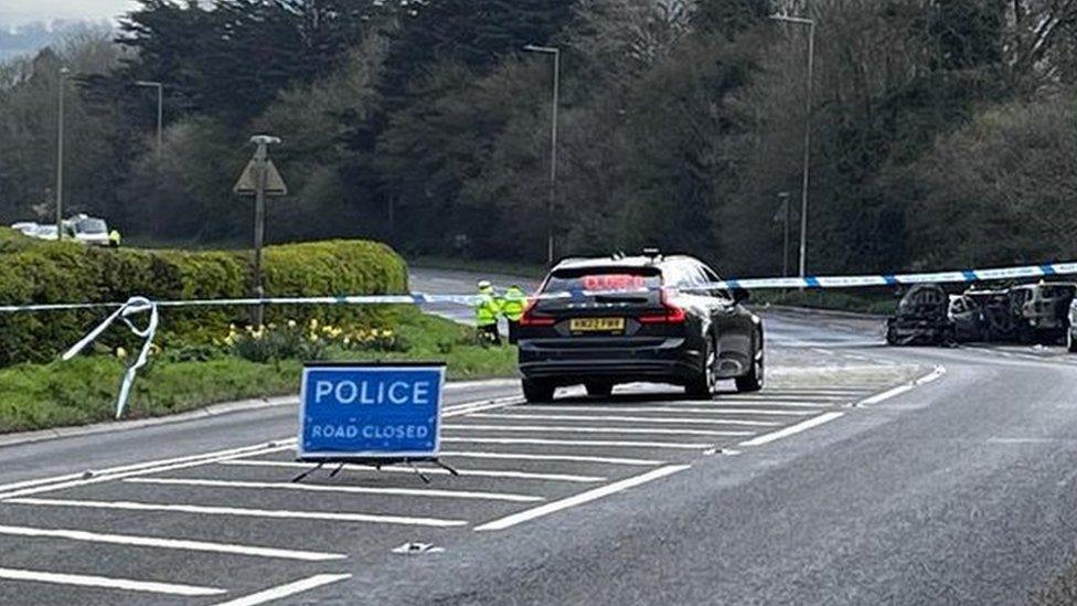 Road closure and police car on A38