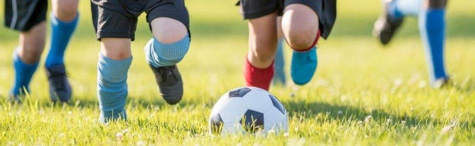 Children playing football