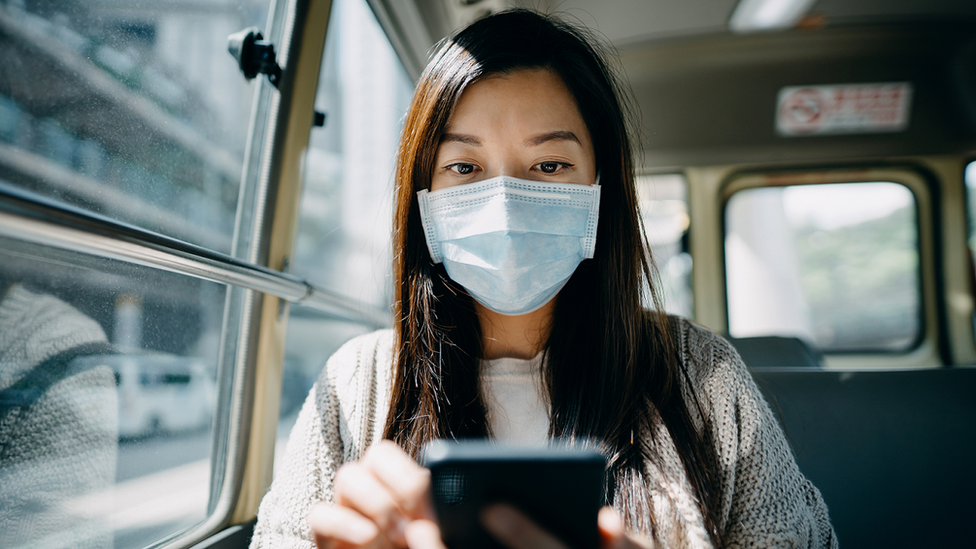 A woman using a smartphone