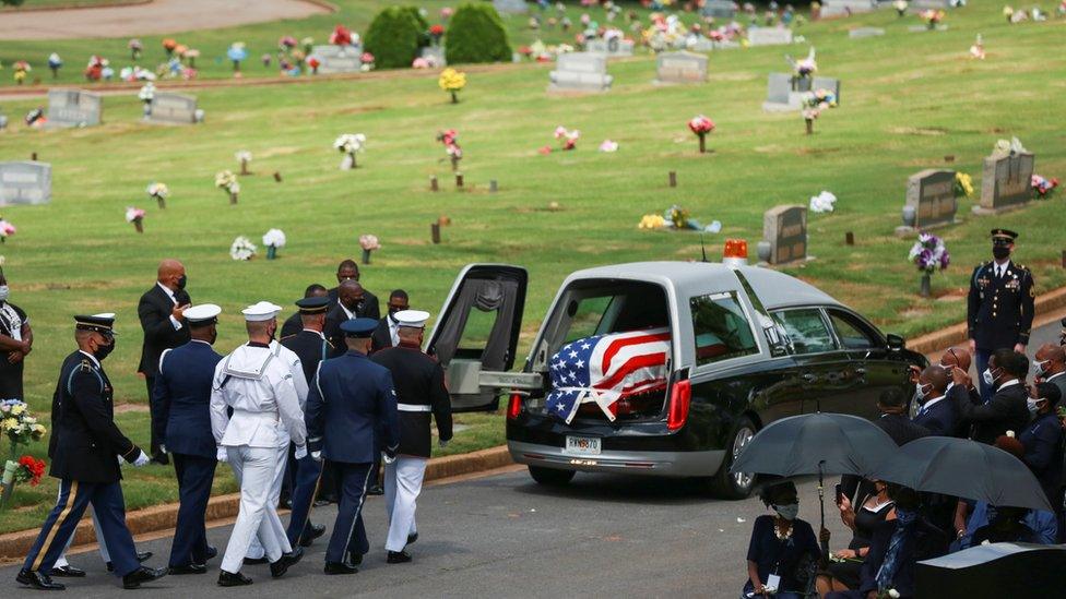 the hearse carrying Lewis's body