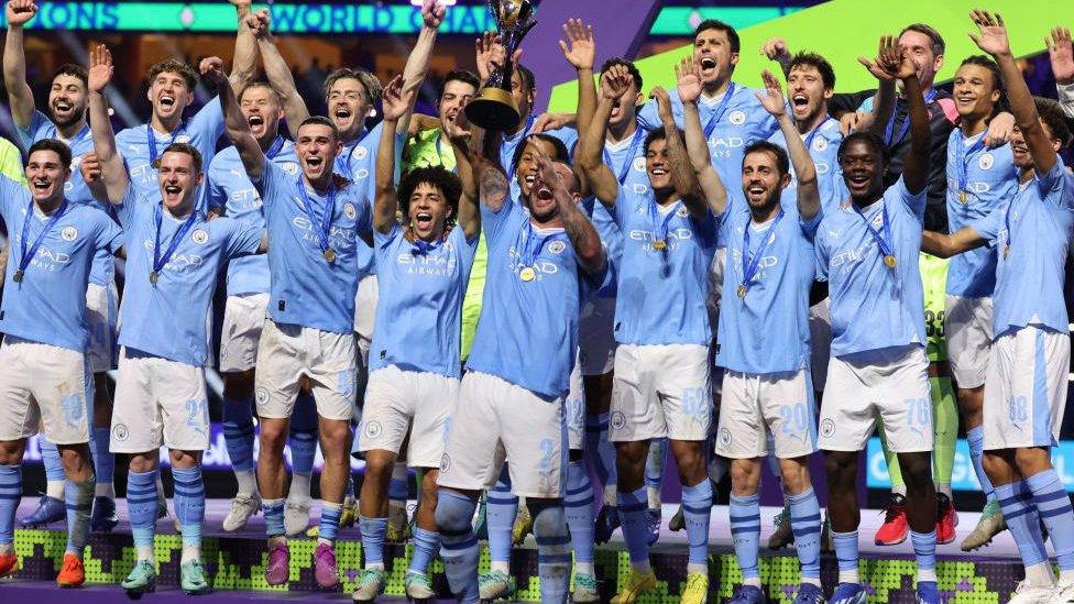 Manchester City lift the Club World Cup trophy