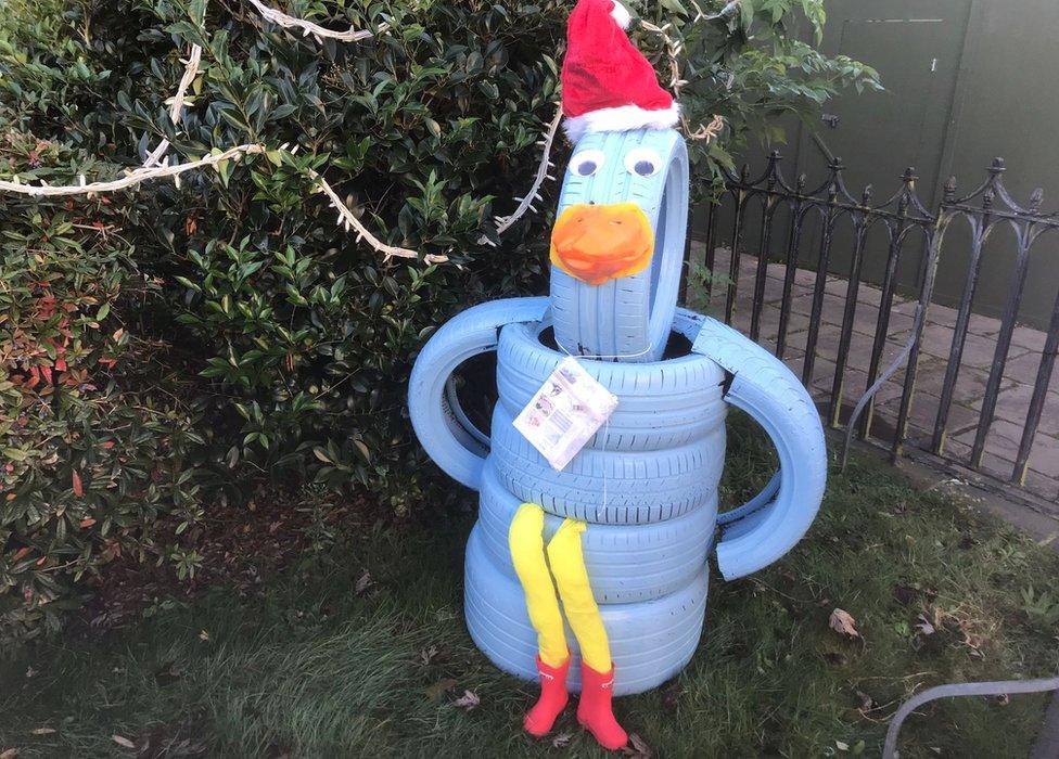 Snowmen made from old tyres in Sudbury