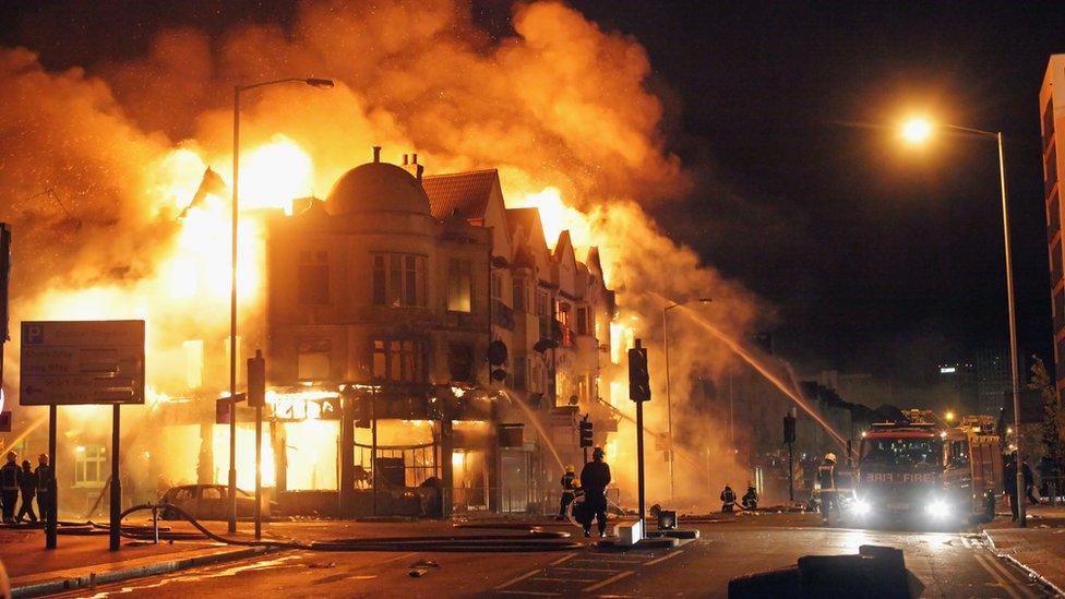 Firefighters try to extinguish a burning building, Croydon, 9 Aug 2011