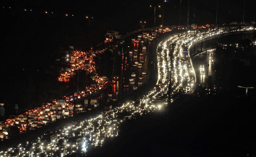 After the heavy rain, vehicles stuck in long traffic jam at Delhi-Gurgaon expressway on July 28, 2016 in Gurgaon, India.