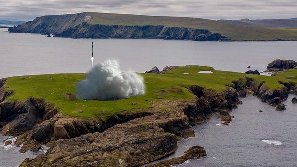 Computer generated image of SaxaVord UK spaceport of a rocket taking off from Lamba Ness in Unst