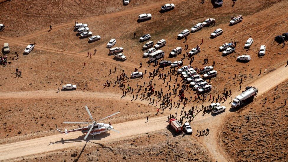 A rescue team search for the wreckage of Iranian airline Aseman flight EP3704, in Zagros mountain, Semirom, Iran, 20 February 2018.