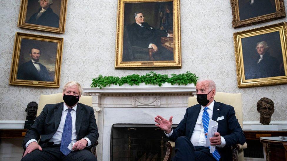 US President Joe Biden meets with British Prime Minister Boris Johnson in the Oval Office of the White House