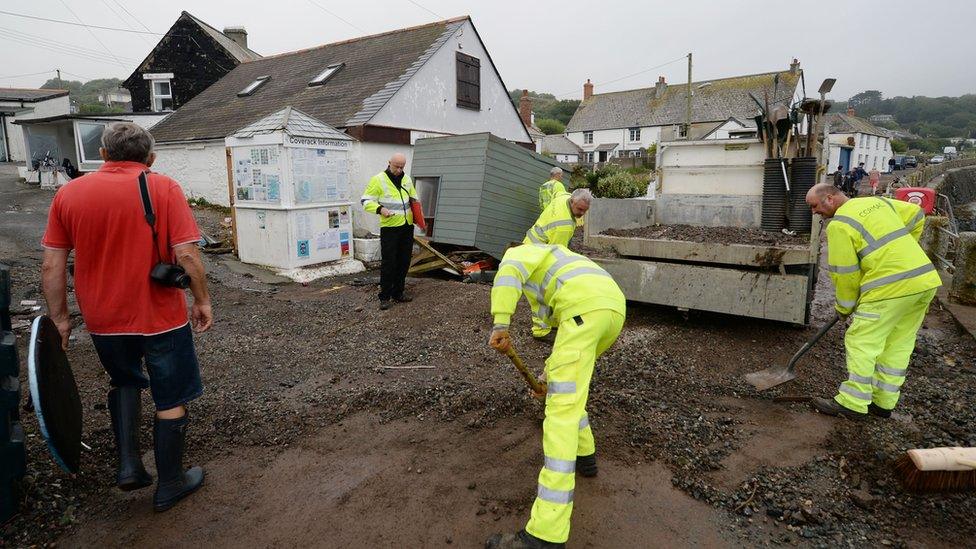 Clean-up crews removing debris