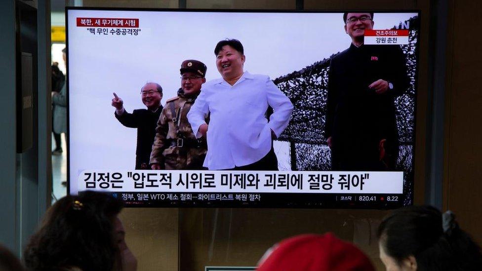 TV screengrab of Kim Jong Un overseeing the launch of a new nuclear-capable underwater drone