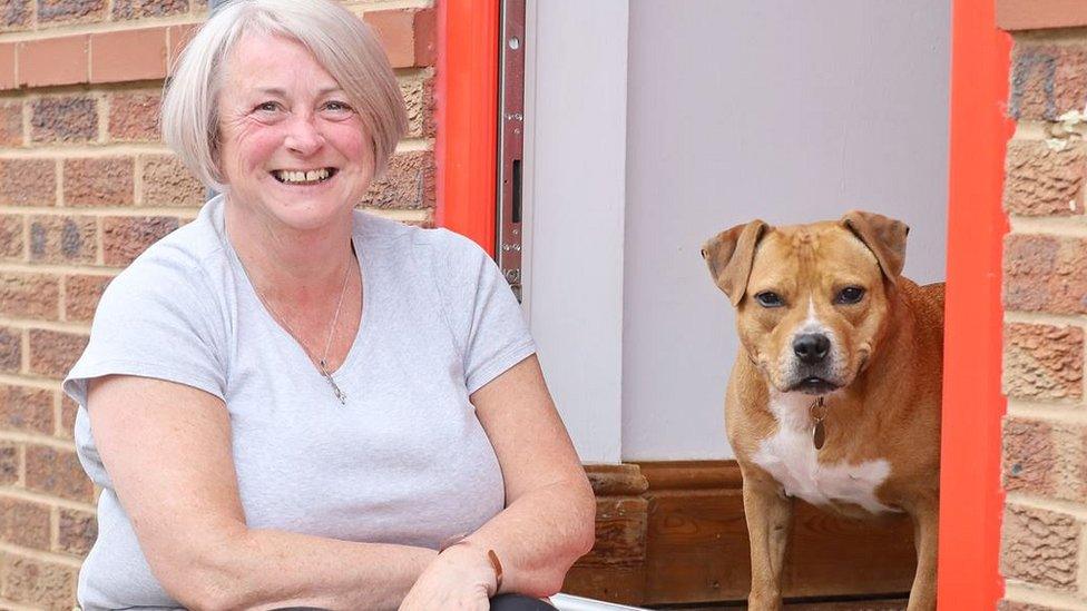 Christine Drysdale a Leeds foster carer, with Staffordshire bull terrier, Belle