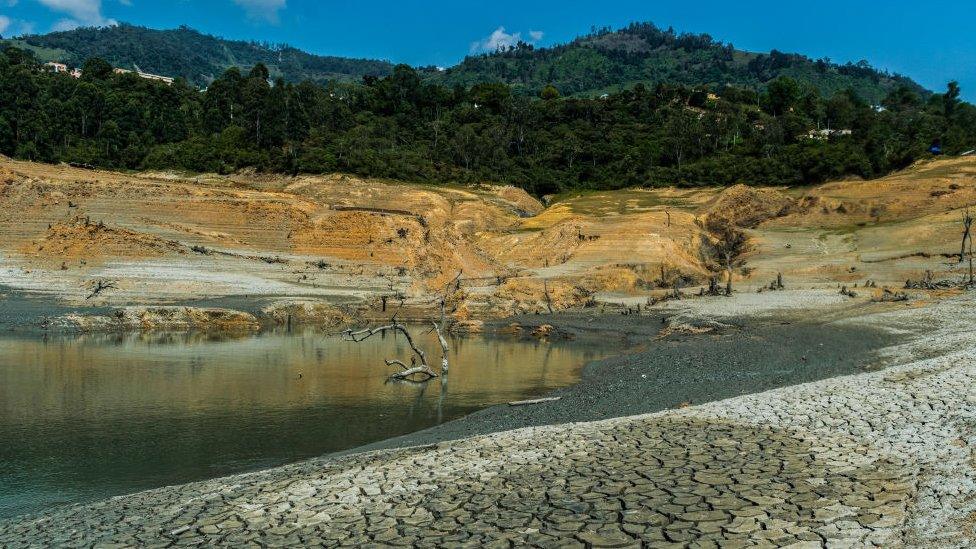 View showing the low water level of the Guavio reservoir that feeds the Guavio Hydroelectric Power Plant in Gachala, Cundinamarca Department, Colombia, on April 16, 2024.