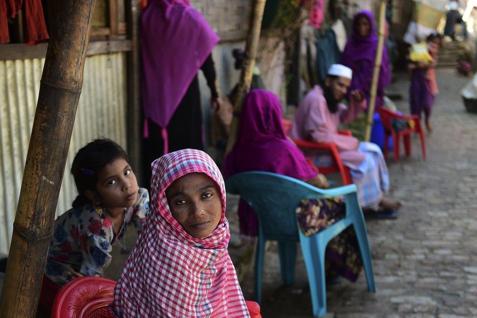 In this photograph taken on 26 November 2016, Myanmar Rohingya refugees look on in a refugee camp in Teknaf, in Bangladesh's Cox's Bazar.