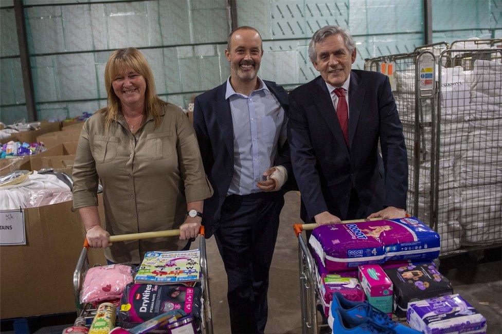 Pauline Buchan, John Boumphrey and Gordon Brown at the Amazon warehouse in Lochgelly