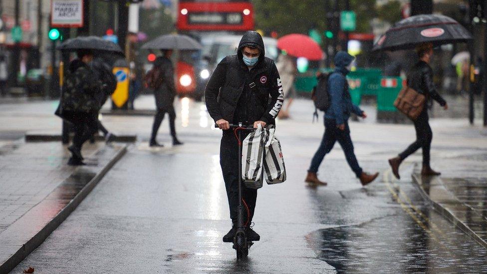 Man on e-scooter on Oxford Street