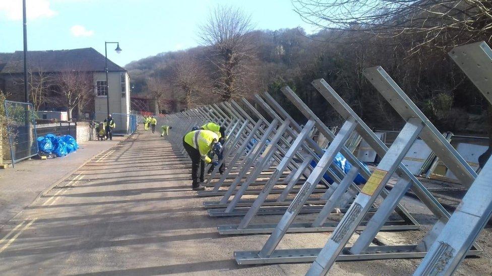 Flood barriers are taken down