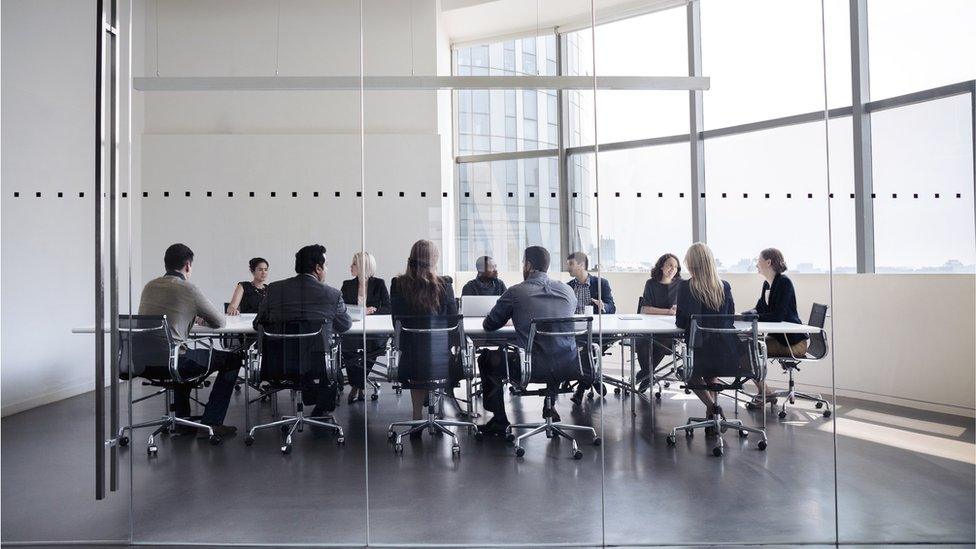 People sitting round a table