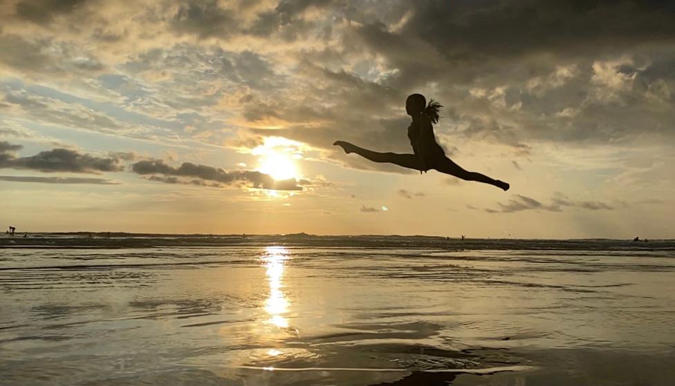 Girl jumping in the air