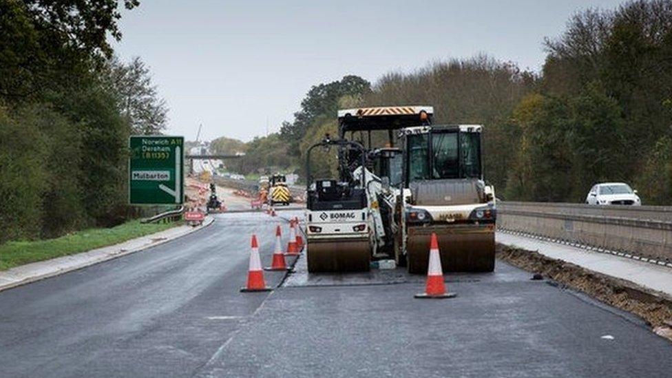 Heavy machinery on newly-resurfaced A11