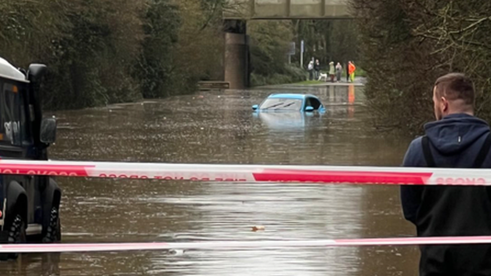 A car is submerged in flood water on the B4265 in Llantwit Major