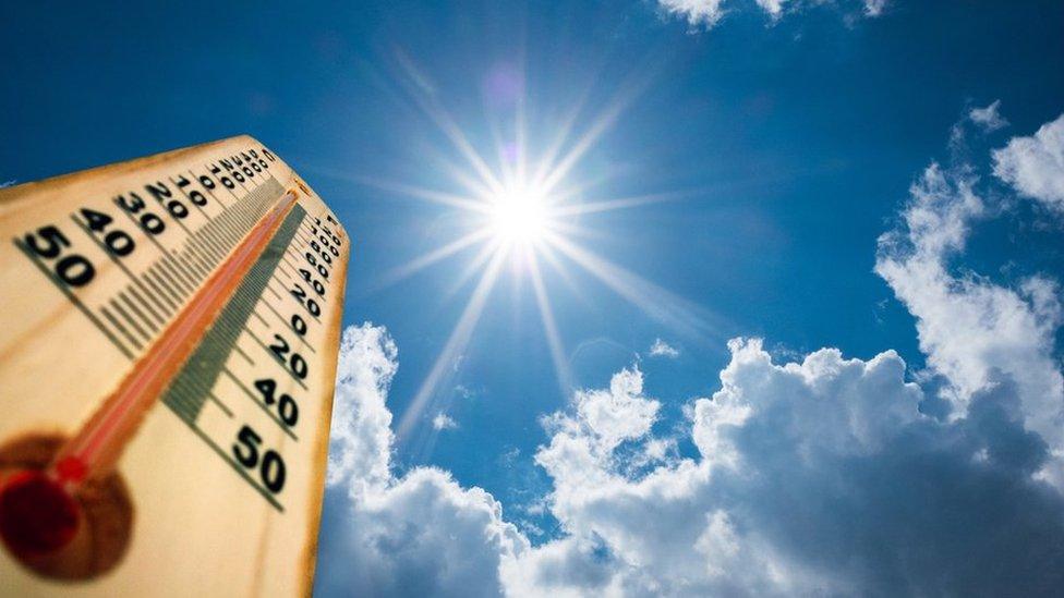 Giant thermometer sits in the sun