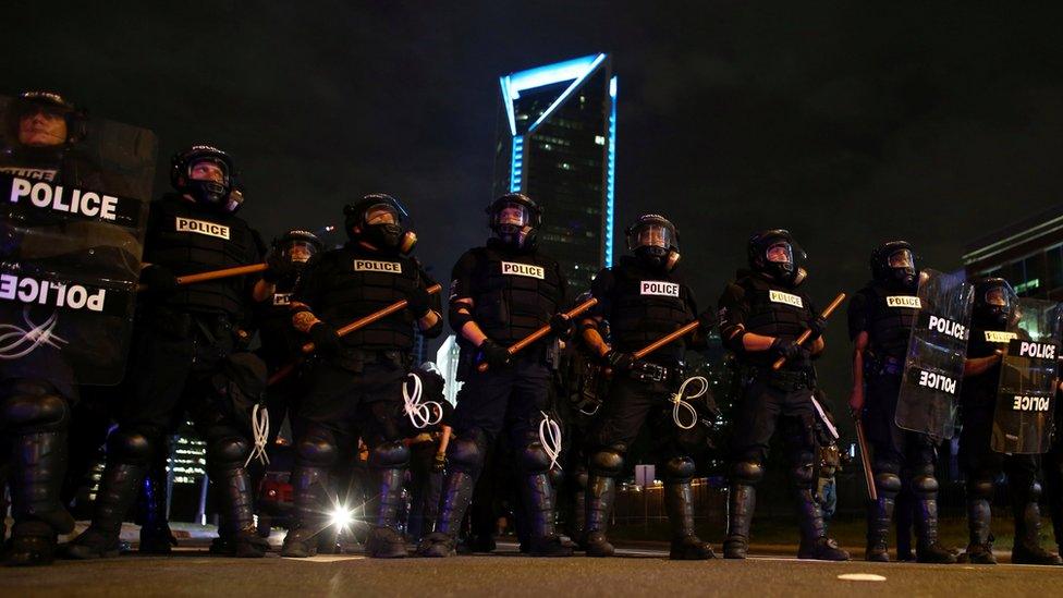 Police keep demonstrators off the highway in Charlotte, North Carolina on September 23, 2016.