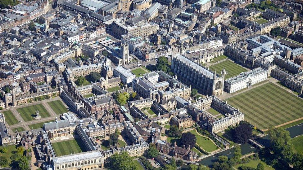 High level oblique aerial view south-east of Cambridge including River Cam, historic University colleges and 'the backs' in summer Cambridgeshire