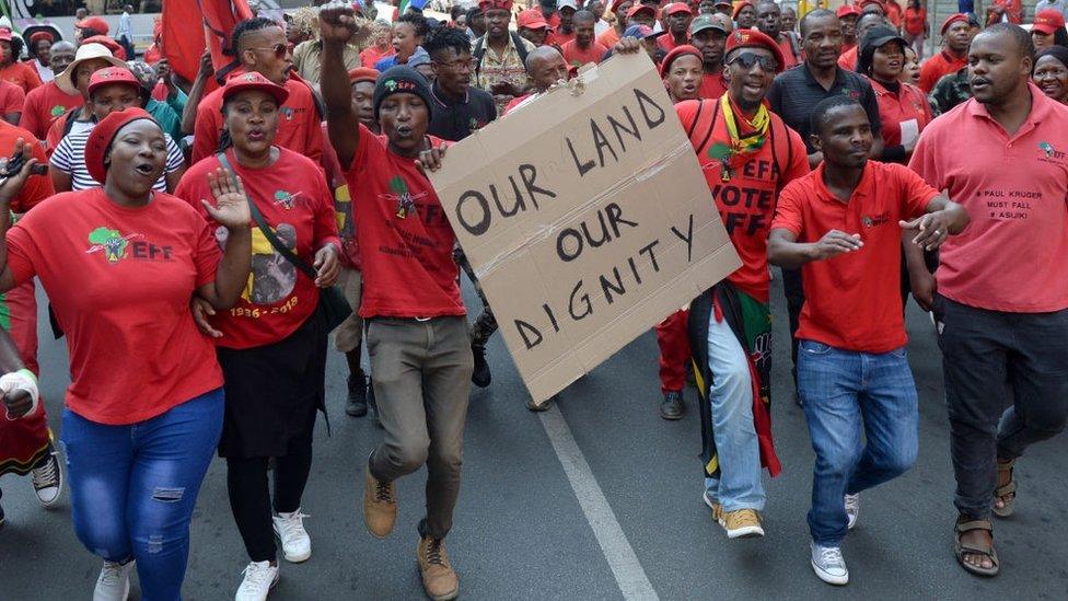 Economic Freedom Fighters (EFF) supporters gather outside the North Gauteng High Court during the partys bid to challenge the constitutionality of the Riotous Assemblies Act on September 20, 2018 in Pretoria, South Africa