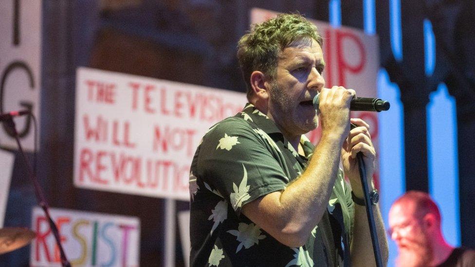 Terry Hall performing in Coventry Cathedral ruins