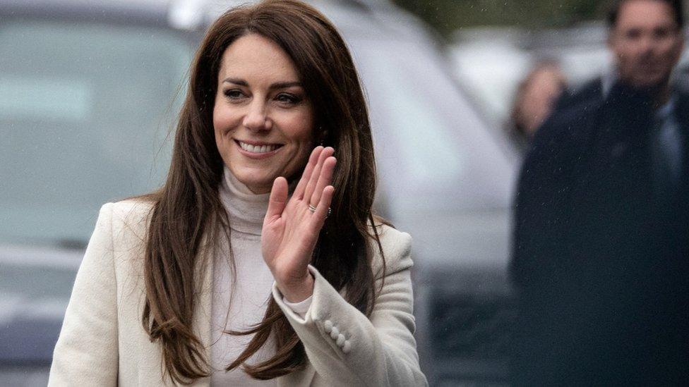 Kate waves as she exits a car in Port Talbot