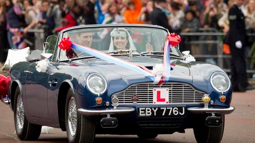 2011: Prince William after his wedding in his father's classic Aston Martin DB6 Volante