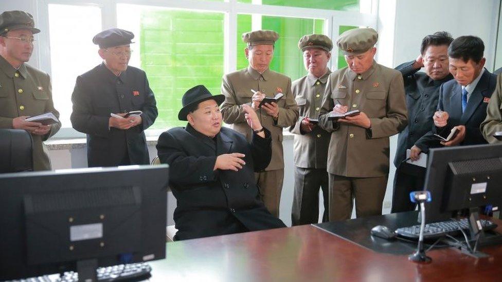 Kim Jong-un speaks to officials at the Paektusan Hero Youth Power Station No. 3 in Ryanggang Province (23 April 2016)