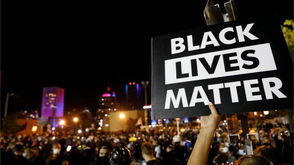 Demonstrators take part in a protest in Rochester, New York. 6 Sept 2020