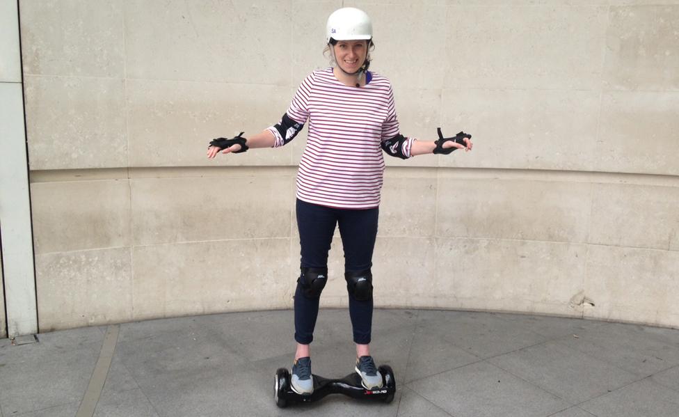 Emma just outside NBH Entrance on a hoverboard