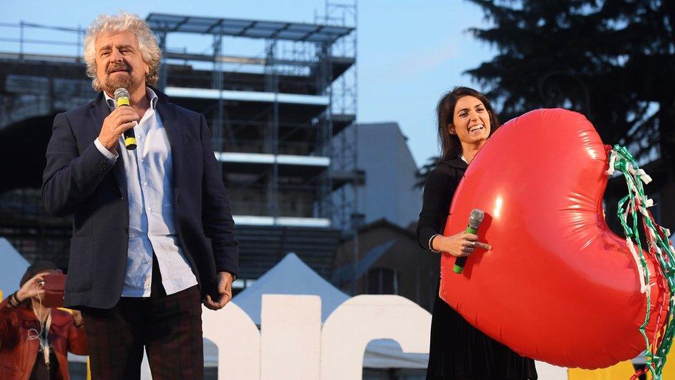 Five Star Movement leader Beppe Grillo, left, with Rome Mayor Virginia Raggi on 26 Nov