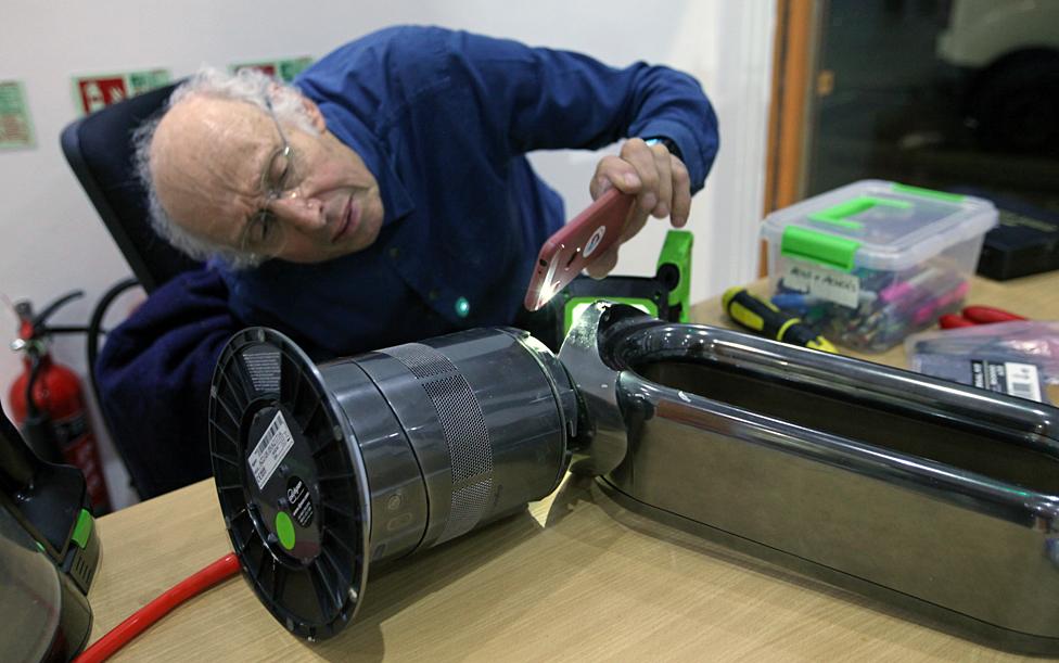 Tony repairs a bladeless fan at the Fixing Factory in Camden, London