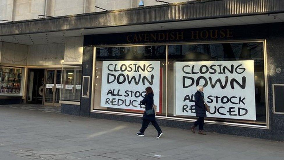 Cavendish House in Cheltenham shown from the outside with House of Fraser sale signs