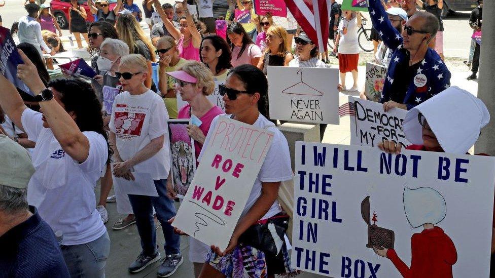 People gather on the steps of the Federal Courthouse in Fort Lauderdale on May 7, 2022 for a rally to support abortion rights. Planned Parenthood is planning 15 Florida rallies on Saturday, May 14, including one at the Federal Courthouse in Fort Lauderdale.