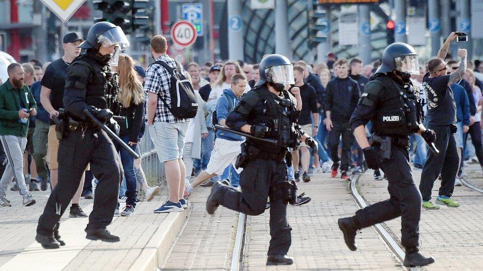 Police run through Chemnitz, 26 August