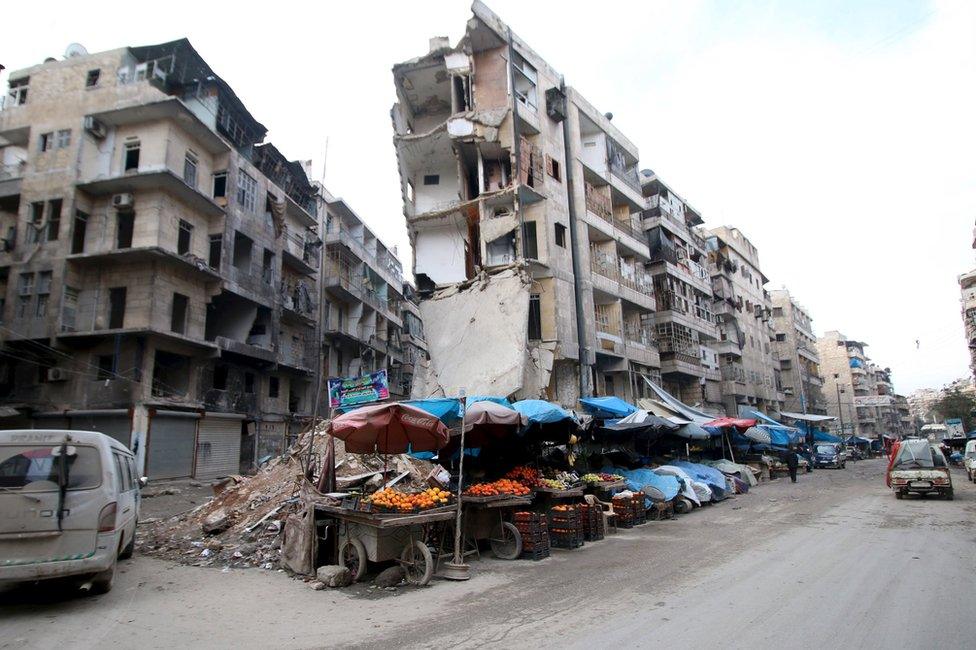 Damaged buildings in the rebel-held al-Shaar district of Aleppo, Syria (10 February 2016)