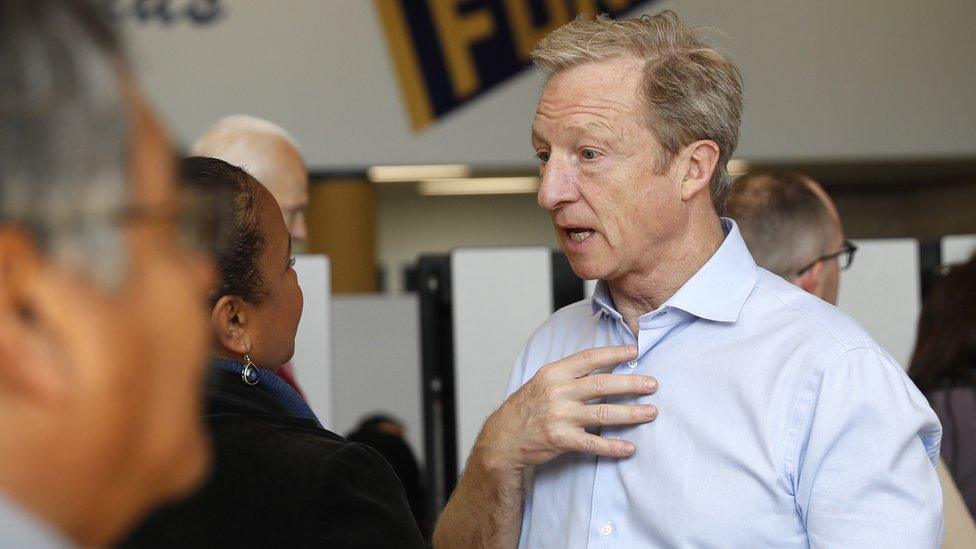 Democratic presidential candidate Tom Steyer talks to voters inside the Nevada Caucus at Cheyenne High School in North Las Vegas, Nevada, February 22, 2020.