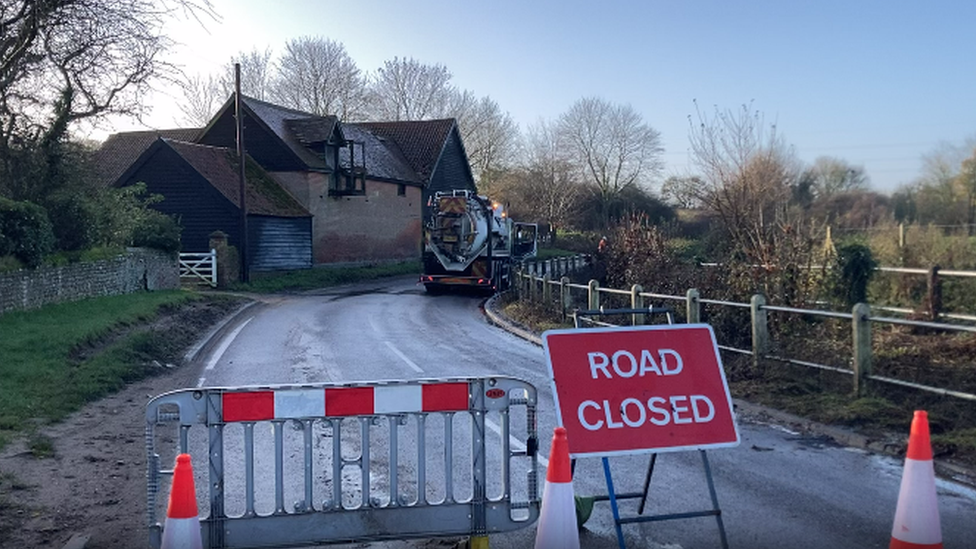 A tanker removing flood water at Barking Road