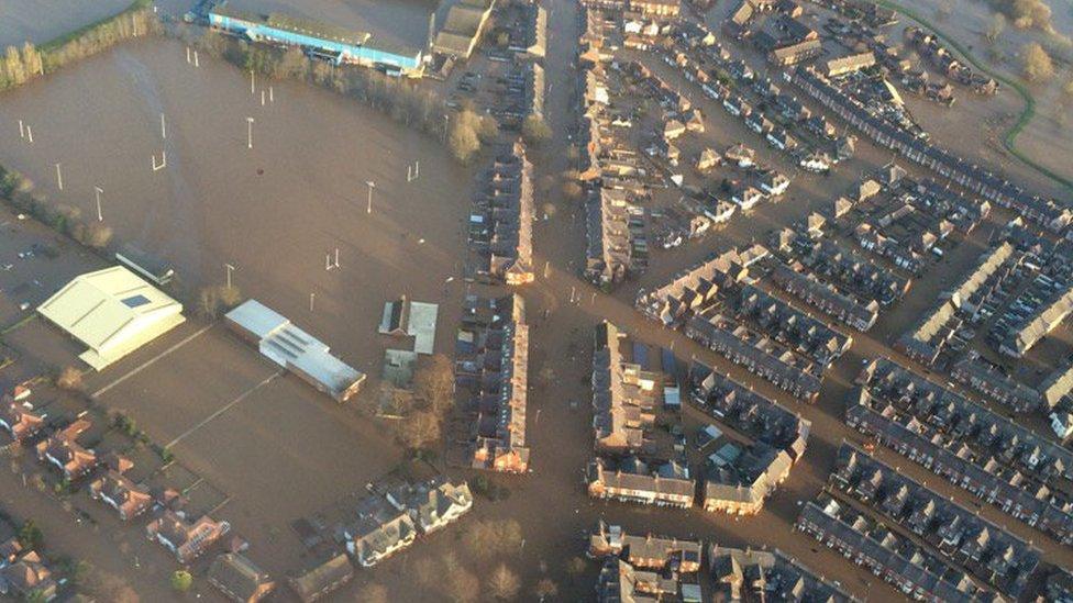 The people of Carlisle have been flooded in 2005 and 2009 and now again with the full extent captured in this aerial photo by the BBC's David Shukman