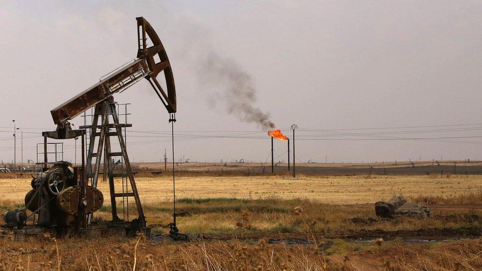 Oil pumpjack at the Rumaila oil field in Syria's Hassakeh province (15 July 2015)