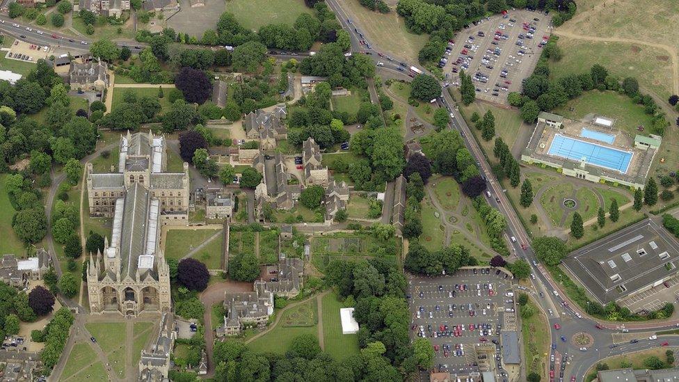 Aerial shot of Peterborough city centre, featuring the cathedral and lido