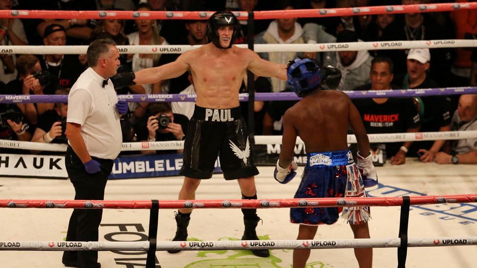 Logan Paul taunting KSI in the boxing ring