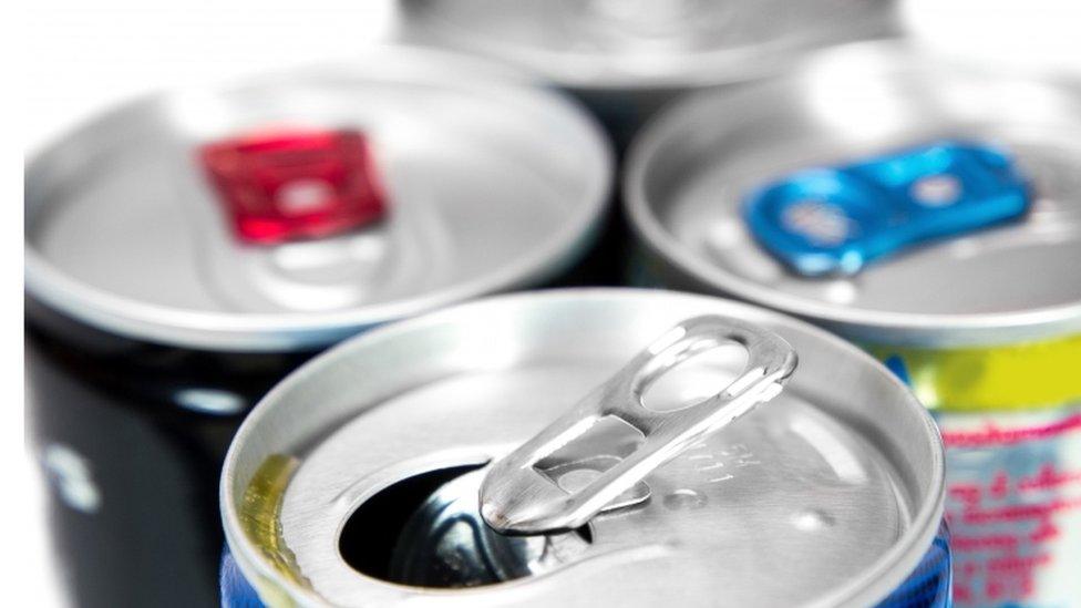 close up of energy drink cans