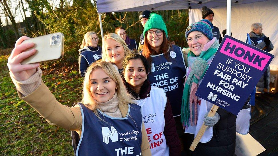 Nurse taking selfie on strike